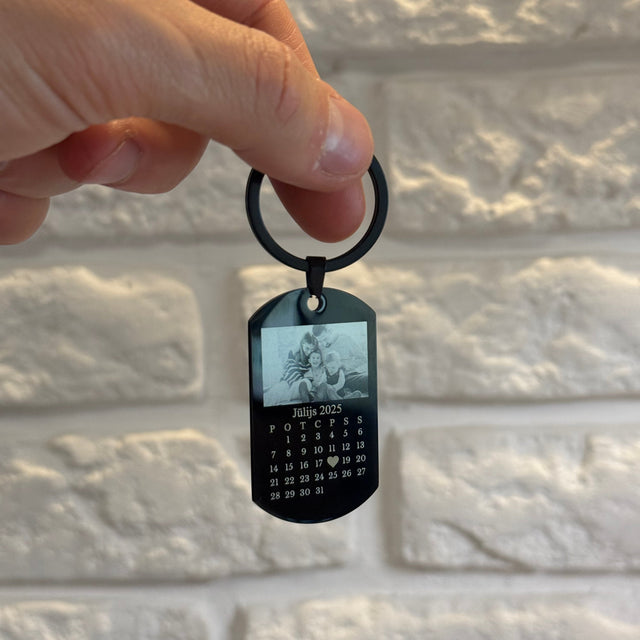 Attēla gravējuma atslēgu piekariņš