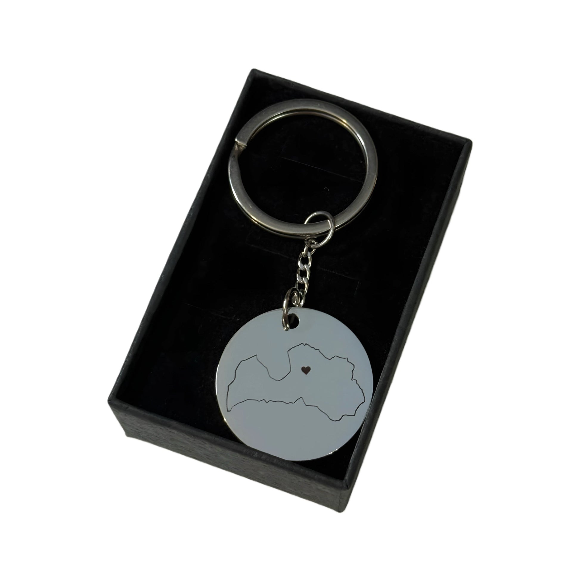 Latvijas formas atslēgu piekariņš ar atzīmētu pilsētu